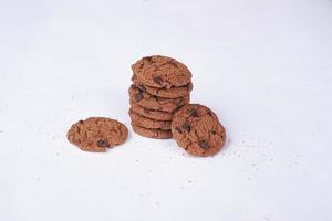 Chocolate cookies on a white table photo