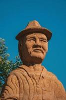 Nova Petropolis, Brazil - July 20, 2019. Sculpture detail of a immigrant at Sculpture Park Stones of Silence near Nova Petropolis. A lovely rural town founded by German immigrants. photo