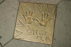 Gramado, Brazil - July 21, 2019. Metal plaque on the walk of fame in front of the Festivals Palace at the main avenue of Gramado. A cute european-influenced town highly sought after by tourists. photo