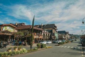 Buildings and people on the main street of Gramado photo