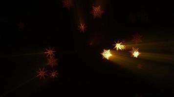 Falling gold snowflake shine on dark background video