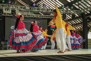 Nova Petropolis, Brazil - July 20, 2019. Colombian folk dancers performing a typical dance on 47th International Folklore Festival of Nova Petropolis. A lovely rural town founded by German immigrants. photo