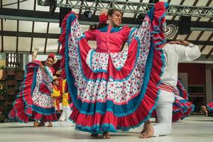 Colombian folk dancers performing a typical dance photo