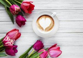 Coffee and tulips photo