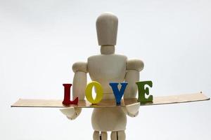 Love and a wooden man. photo