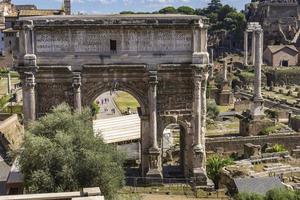 Arch of Septimius Severus in Roman Forum at Rome, Italy photo