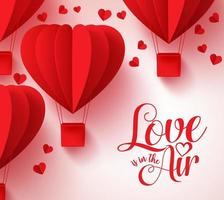 El amor está en el aire tipografía para el día de San Valentín con globos rojos en forma de corazón cortados en papel volando de fondo. ilustración vectorial. vector