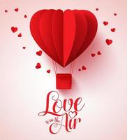 El amor está en el aire tipografía para el día de San Valentín con globos en forma de corazón rojo cortados en papel volando y decoraciones de corazones en fondo blanco. ilustración vectorial. vector