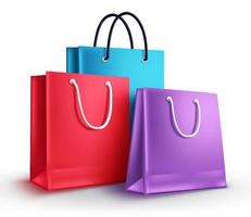 Colorful shopping bags vector illustration. Group of empty paper bags with different colors isolated in white for shopping design elements.