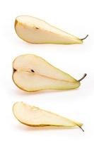 Cut yellow pear fruits. Collection of yellow pear pieces of different shapes on white background photo