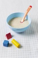 high angle baby food with toys photo