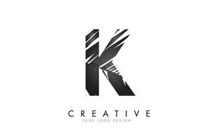 Black Leaf K letter logo design with palm tree leaf detail vector illustration.
