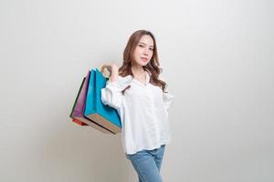 portrait beautiful Asian woman holding shopping bag photo