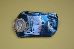 KIEV, UKRAINE - DECEMBER 22, 2021 Crumpled beer cans for scrap