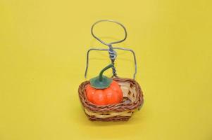 Human figure made of metal wire with an object photo