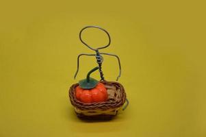 Human figure made of metal wire with an object photo