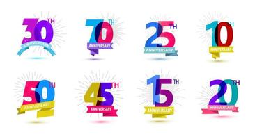 Vector set of anniversary dates compositions with ribbons, years birthday logo labels. Isolated.