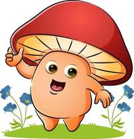 The mushroom is holding the hood in the garden vector