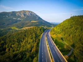 aerial highway road in mountains photo