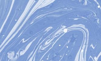 Liquid marble painting background design with cornflower color photo