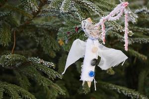 Children's Creative Decoration For Beautiful Green Pine Tree. Festive Objekts On The Christmas Market.
