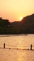 The beautiful lake landscapes in the Hangzhou city of the China in spring with the sunset sunlight photo