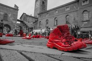 Bergamo italy 2012 Red shoes to denounce violence against women photo