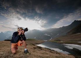 Zorzone Italy 2015 Photographer while he is shooting the landscape photo