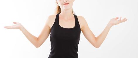 A happy girl spreads her hands on a white isolated background. Woman in shirt. photo