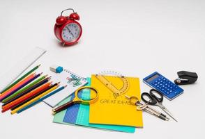 colorful collection of school supplies set on white background. back to school. great ideas photo