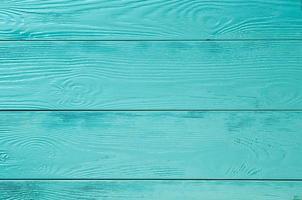 background of wooden boards painted light blue and turquoise photo