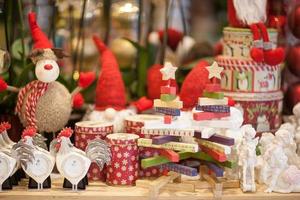 set and a collection of Christmas toys and decorations put up a shelf photo