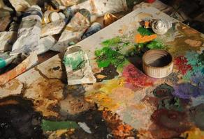 many used tubes of art paint. concept artistic and creative chaos photo