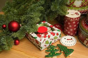 New Year Christmas cookies with Christmas decorations and the Christmas tree branch photo