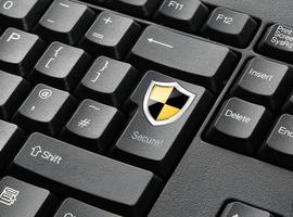 A Black Keyboard With Secure Shield Key photo