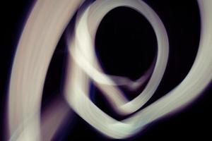 Glowing abstract curved lines photo