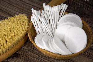 Cotton buds and pads made of natural cotton. Hygienic care supplies. photo