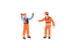Close up of Miniature people in engineer and worker occupation isolate on white background. Elegant Design with copy space for placement your text, mock up for industrial and construction concept