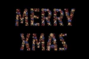 Colour fireworks light up forming a MERRY CHRISTMAS word on black background with dazzling display. Event and celebrations background concept photo
