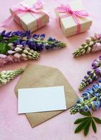 Mockup greeting card  with lupine flowers photo