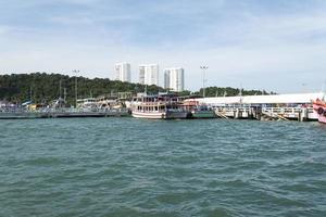 Parking fishing vessels on the island in Thailand. photo