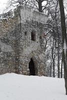 Old stone tower in the city Park. photo