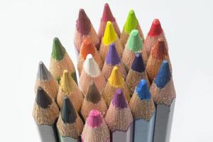 Colored pencils on a white background. photo