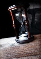 Broken hourglass - sand clock photo