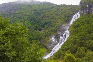 Beautiful Hjellefossen waterfall Utladalen Ovre Ardal Norway. Most beautiful landscapes. photo