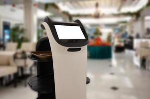 Artificial intelligence assistant personal robot for serve foods in restaurant photo