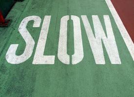 Slow down sign photo
