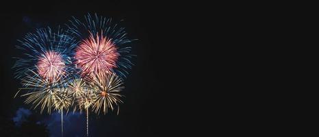 Abstract colored firework on dark sky. Celebration and anniversary concept photo