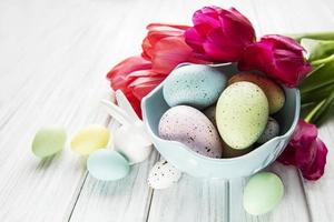 Decorative Easter eggs and tulips photo