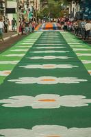 Sao Manuel, Brazil - May 31, 2018. Artistic colorful sand carpet made by the devotees for the celebration of Holy Week on the street of Sao Manuel. A little town in the countryside of Sao Paulo State. photo